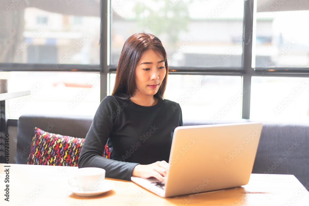Young thoughtful Asian business woman working in modern office, taking notes and thinking of professional plan, project and working.successful lady. Young thoughtful Asian business woman working in modern office, taking notes and thinking of professional plan, project and working.successful lady.