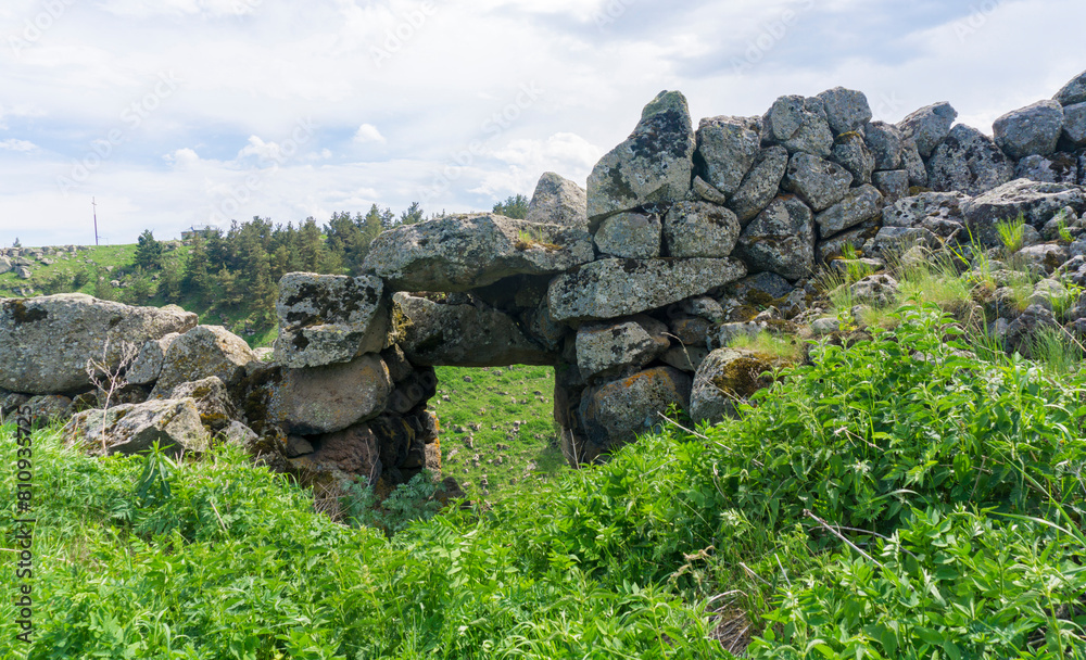 Wall of a prehistoric megalithic fortress and a passage made of huge stones. Ktsia, Avranlo, Georgia Wall of a prehistoric megalithic fortress and a passage made of huge stones. Ktsia, Avranlo, Georgia