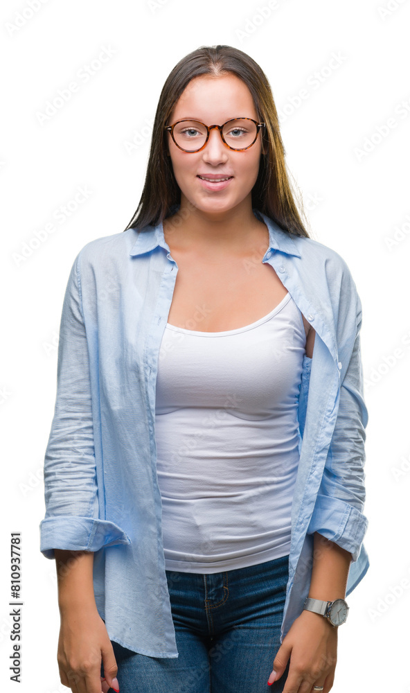 Obraz premium Young caucasian beautiful business woman wearing glasses over isolated background with a happy and cool smile on face. Lucky person.