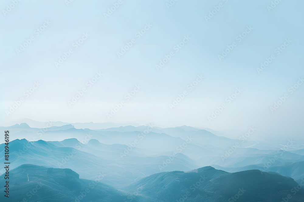 mountains with mist light blue sky