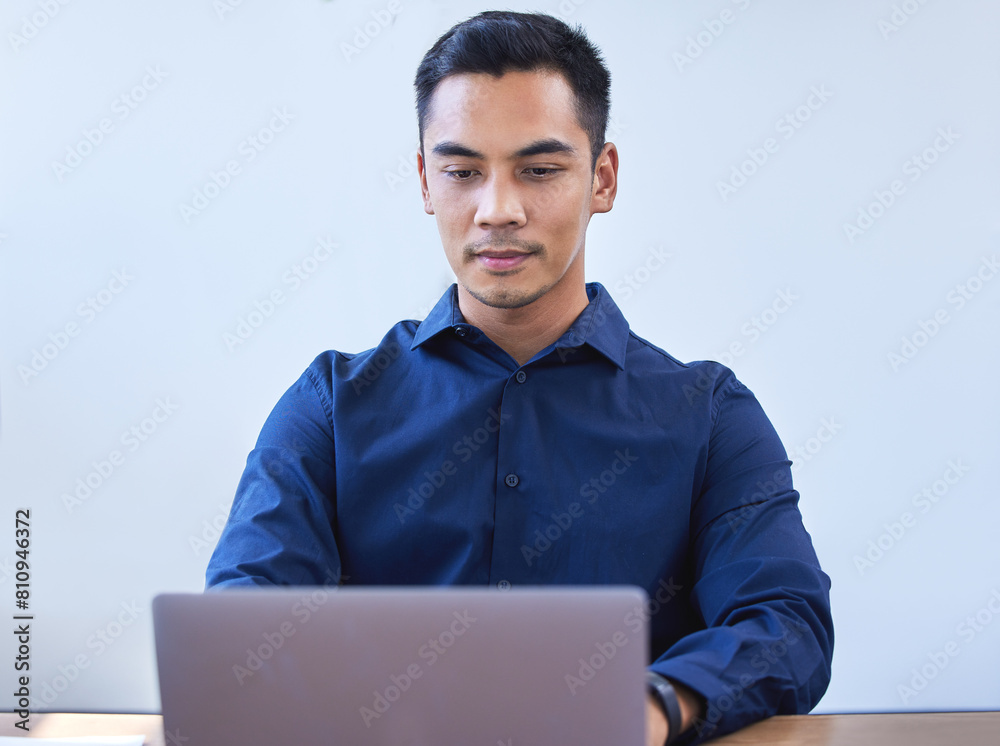 Laptop, typing and business man reading email for project, research or communication online in office. Computer, serious and professional on website for planning, networking or agent writing report Laptop, typing and business man reading email for project, research or communication online in office. Computer, serious and professional on website for planning, networking or agent writing report