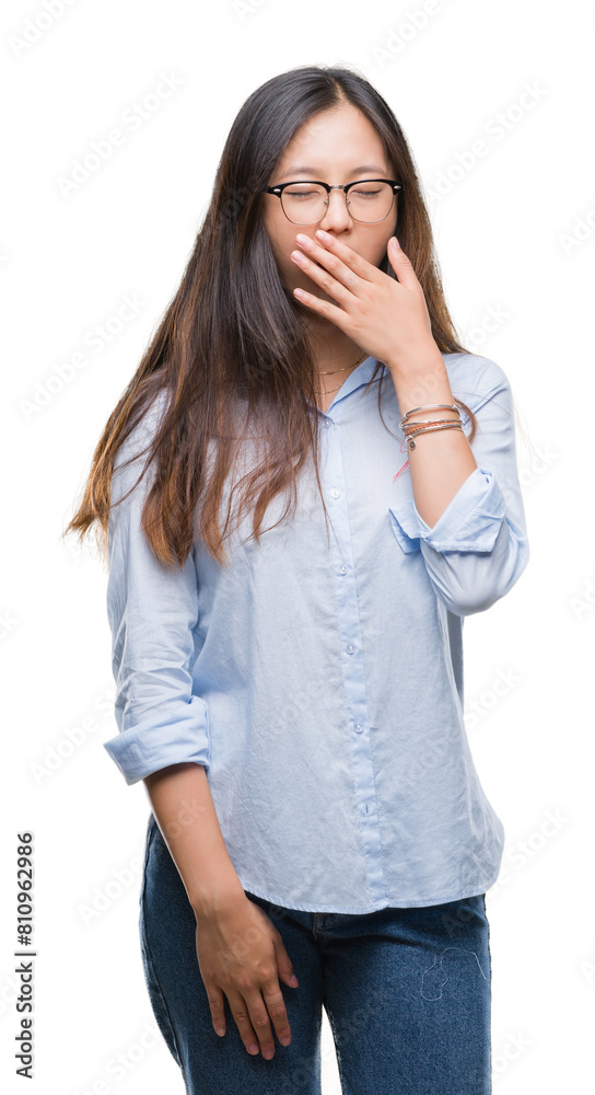 Young asian business woman wearing glasses over isolated background bored yawning tired covering mouth with hand. Restless and sleepiness. Young asian business woman wearing glasses over isolated background bored yawning tired covering mouth with hand. Restless and sleepiness.