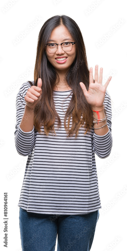 Young asian woman wearing glasses over isolated background showing and pointing up with fingers number six while smiling confident and happy. Young asian woman wearing glasses over isolated background showing and pointing up with fingers number six while smiling confident and happy.
