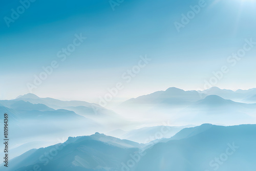 mountains with mist light blue sky © ananda