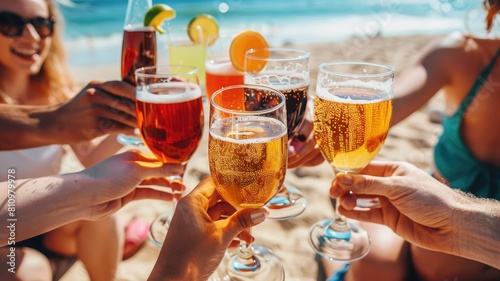 Group of people are toasting with drinks on a beach. Summer. Seasonal