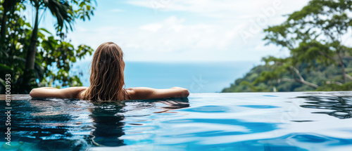 Back view of young woman,girl, female having a rest at the swimming pool at the hotel, spa, resort. Ocean view. Tropical vacation concept. Generative ai