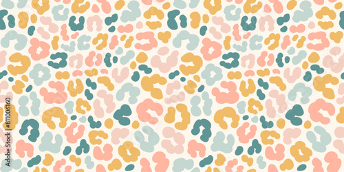 Pastel leopard or cheetah skin print seamless pattern. Hand drawn gender neutral pastel leopard print safari background.