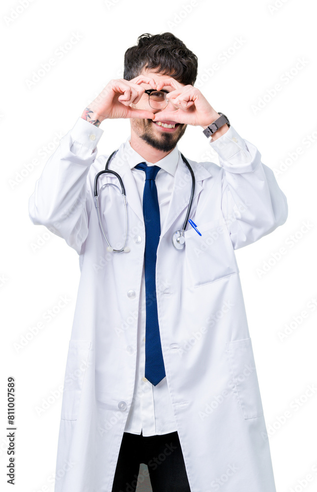Young doctor man wearing hospital coat over isolated background Doing heart shape with hand and fingers smiling looking through sign Young doctor man wearing hospital coat over isolated background Doing heart shape with hand and fingers smiling looking through sign
