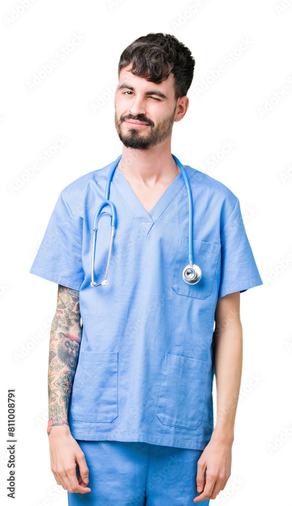 Young handsome nurse man wearing surgeon uniform over isolated background winking looking at the camera with sexy expression, cheerful and happy face. Young handsome nurse man wearing surgeon uniform over isolated background winking looking at the camera with sexy expression, cheerful and happy face.