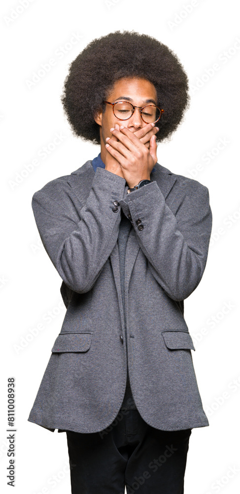 Young african american business man with afro hair wearing glasses shocked covering mouth with hands for mistake. Secret concept.
