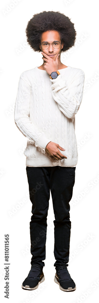 Young african american man with afro hair wearing glasses looking confident at the camera with smile with crossed arms and hand raised on chin. Thinking positive. Young african american man with afro hair wearing glasses looking confident at the camera with smile with crossed arms and hand raised on chin. Thinking positive.