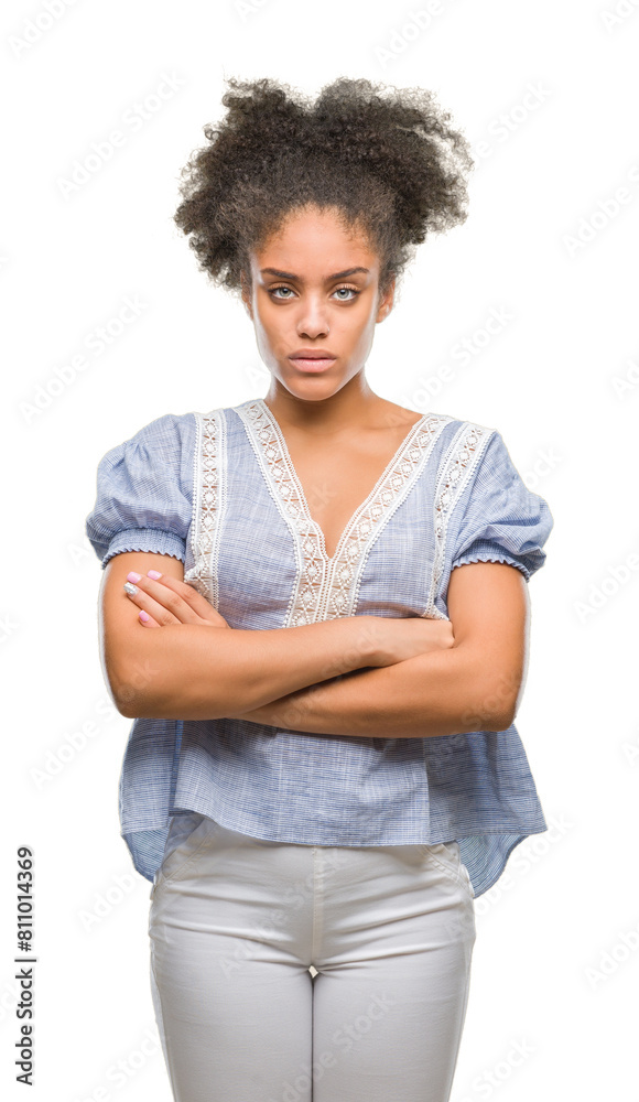 Young afro american woman over isolated background skeptic and nervous, disapproving expression on face with crossed arms. Negative person.
