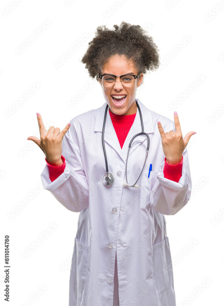 Young afro american doctor woman over isolated background shouting with crazy expression doing rock symbol with hands up. Music star. Heavy concept. Young afro american doctor woman over isolated background shouting with crazy expression doing rock symbol with hands up. Music star. Heavy concept.