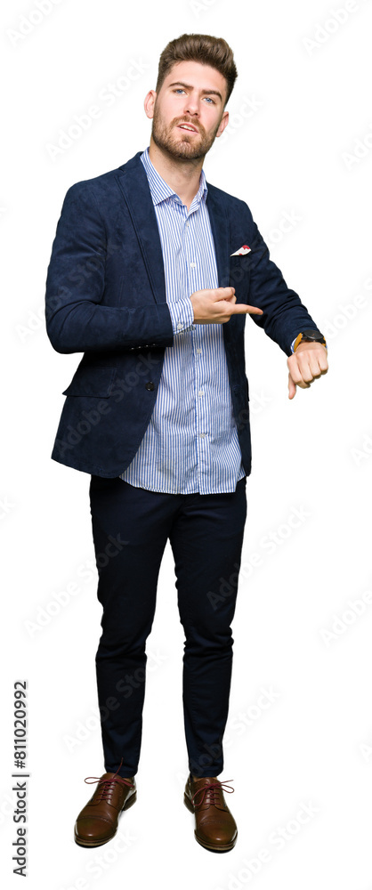 Young handsome bussines man In hurry pointing to watch time, impatience, upset and angry for deadline delay Young handsome bussines man In hurry pointing to watch time, impatience, upset and angry for deadline delay