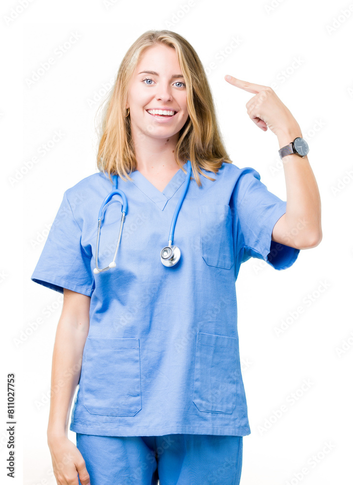 Beautiful young doctor woman wearing medical uniform over isolated background Smiling pointing to head with one finger, great idea or thought, good memory