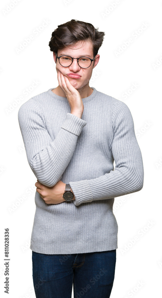 Young handsome man wearing glasses over isolated background thinking looking tired and bored with depression problems with crossed arms.