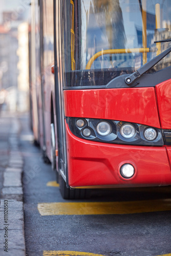 Public transportation bus in urban surroundings.