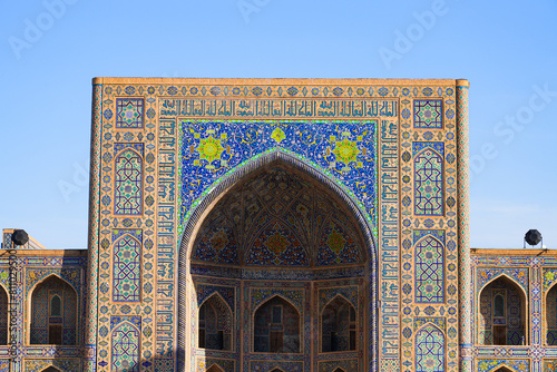 Portal of the Tilla-Kari (Tilya-Kori) Madrasah at the center of the Registan Square in Samarkand, Uzbekistan