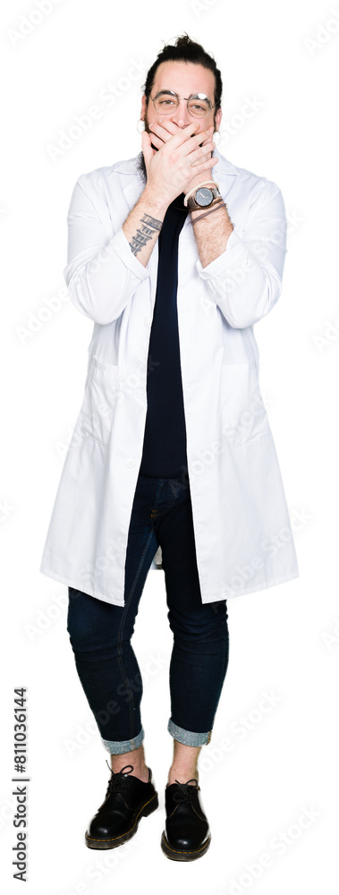 Doctor therapist man with long hair and bear wearing white coat shocked covering mouth with hands for mistake. Secret concept. Doctor therapist man with long hair and bear wearing white coat shocked covering mouth with hands for mistake. Secret concept.