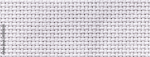 White textile background with checkered pattern, closeup. Structure of the fabric macro.