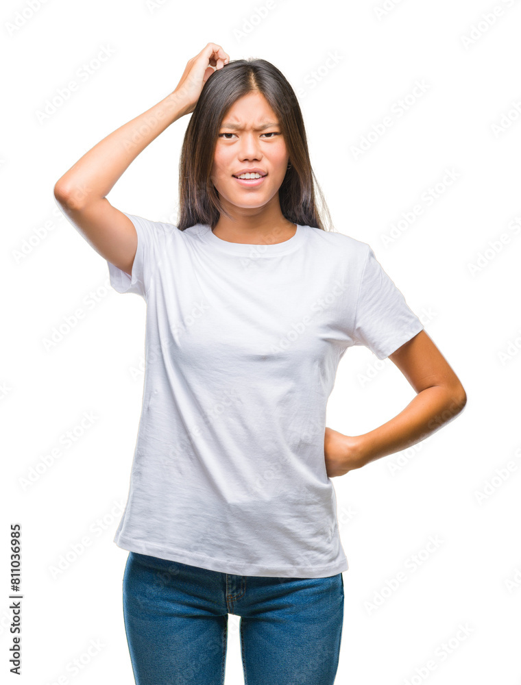 Young asian woman over isolated background confuse and wonder about question. Uncertain with doubt, thinking with hand on head. Pensive concept. Young asian woman over isolated background confuse and wonder about question. Uncertain with doubt, thinking with hand on head. Pensive concept.