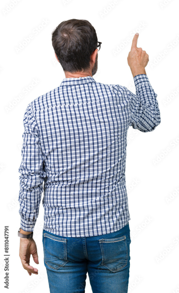 Handsome middle age elegant senior man wearing glasses over isolated background Posing backwards pointing behind with finger hand Handsome middle age elegant senior man wearing glasses over isolated background Posing backwards pointing behind with finger hand