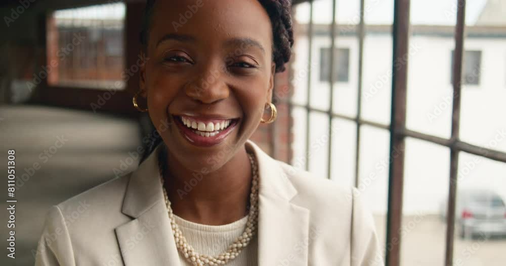 Professional Black Woman Texting on Smartphone in A Modern Coworking Space Professional Black Woman Texting on Smartphone in A Modern Coworking Space