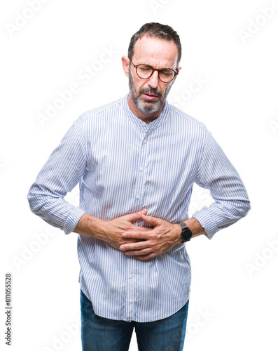 Middle age hoary senior man wearing glasses over isolated background with hand on stomach because indigestion, painful illness feeling unwell. Ache concept.