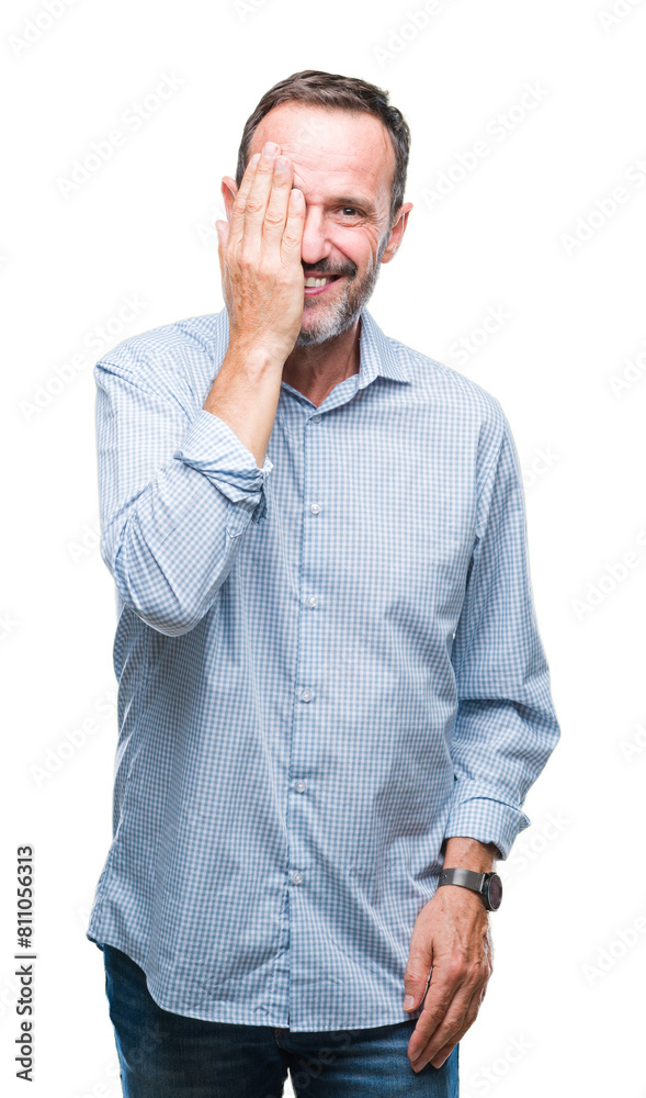 Middle age hoary senior business man over isolated background covering one eye with hand with confident smile on face and surprise emotion. Middle age hoary senior business man over isolated background covering one eye with hand with confident smile on face and surprise emotion.