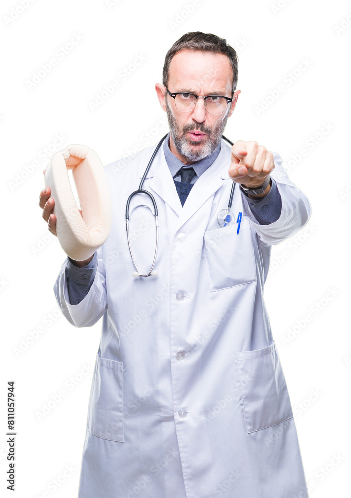 Middle age senior hoary doctor man holding neck collar over isolated background pointing with finger to the camera and to you, hand sign, positive and confident gesture from the front Middle age senior hoary doctor man holding neck collar over isolated background pointing with finger to the camera and to you, hand sign, positive and confident gesture from the front