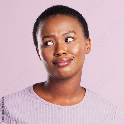 Studio, student and African woman, bored and eye roll for results of exam in college, Gen z and thinking. Pink background, university and scholarship of girl for course in academy and uninterested photo