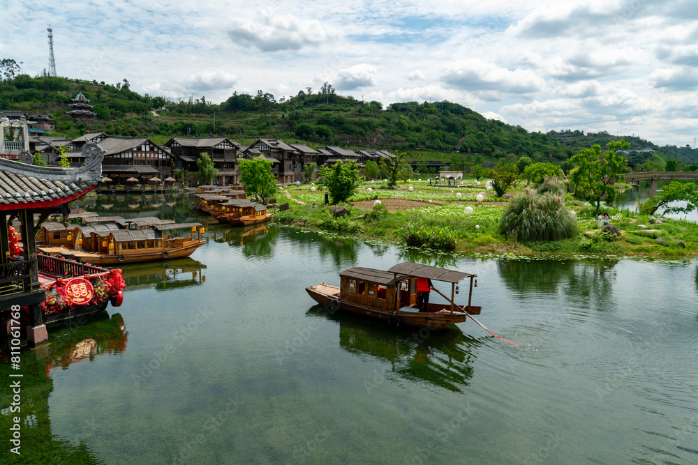 A small boat on the lake, Lizhuang Ancient Town, Yibin, Sichuan, China A small boat on the lake, Lizhuang Ancient Town, Yibin, Sichuan, China