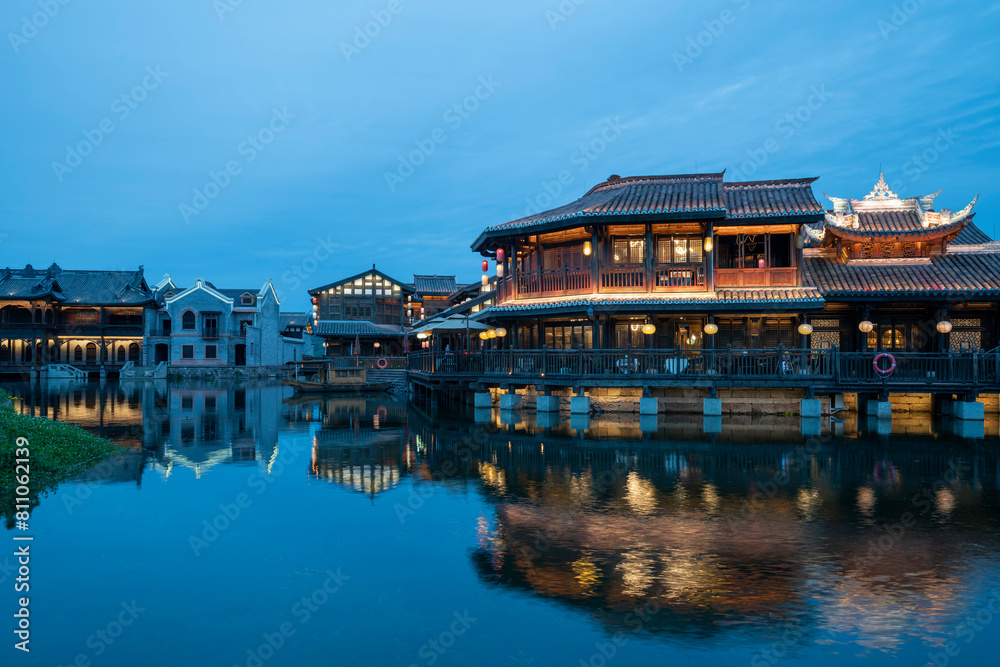 Naklejka premium At night, the beautiful ancient town of Lizhuang on the lake, Yibin City, Sichuan Province, China