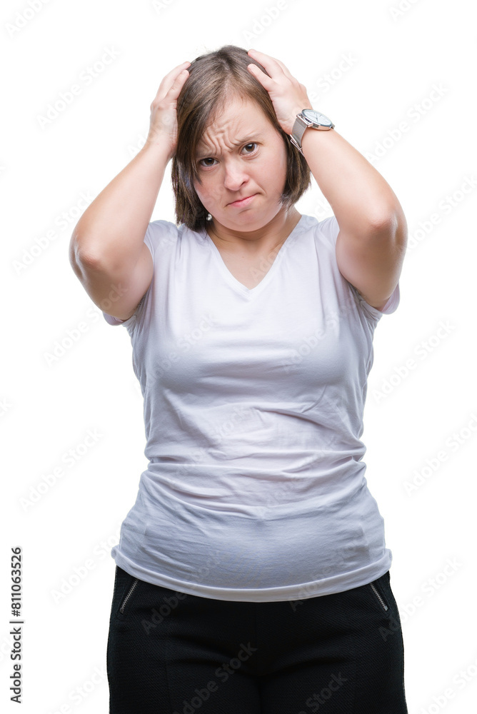 Young adult woman with down syndrome over isolated background suffering from headache desperate and stressed because pain and migraine. Hands on head. Young adult woman with down syndrome over isolated background suffering from headache desperate and stressed because pain and migraine. Hands on head.