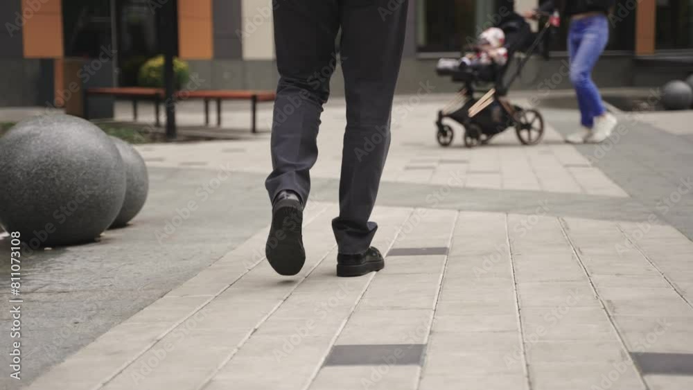 Man going along the street. Cropped. Real time concept Man going along the street. Cropped. Real time concept