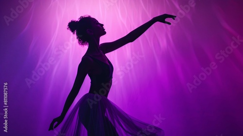 Graceful Dancers Silhouette in Vibrant Purple Backdrop