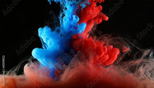 Acrylic blue and red colors in water. Ink blot. Abstract black background.