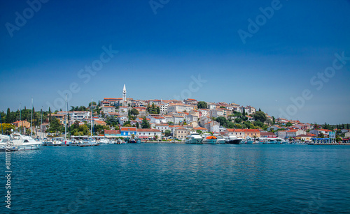 Picturesque coastal Croatia, Rovinj town viewed from water, featuring traditional architecture
