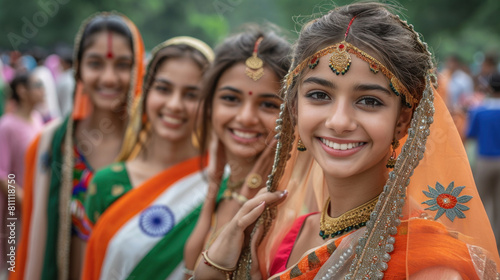 Vibrant Young Indian Women Celebrating with Traditional Sarees and Patriotic Flair