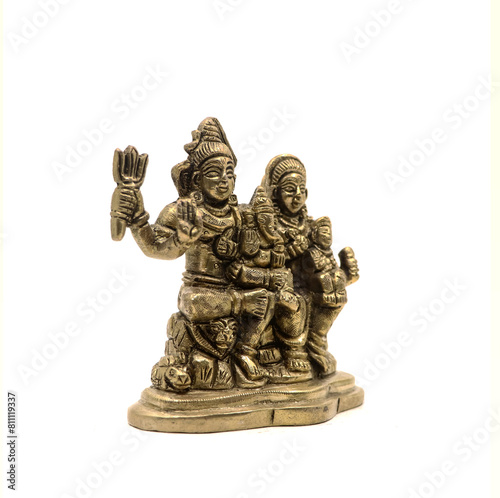 Handcrafted golden brass statue of hindu god of destruction lord shiva family isolated in a white background