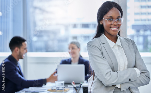 Portrait, business people and black woman with arms crossed, meeting and planning in modern office. Face, group and team leader with confidence, pride and career ambition with project and employees