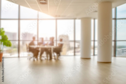 business people walking in the corridor of an business center, pronounced motion blur, crowded bright modern light office movement defocused. office background busy. talking and rushing in the lobby. photo
