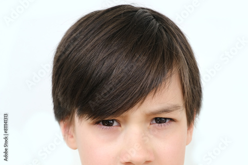 Cuadro en lienzo close up part child face, boy 10 years old, human eye looking directly, concept