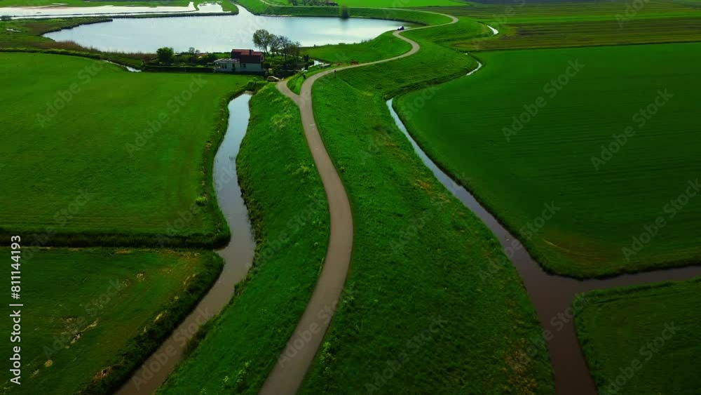 Dutch dijk near a small lake