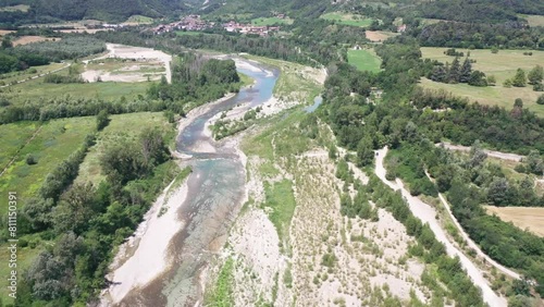 Aerial video of a river in a nature area near the town of Bologna Italy photo