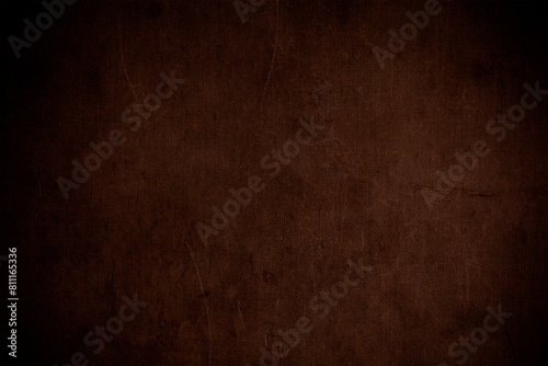 Textured dark brown vintage canvas or paper background with cracks and scratches.