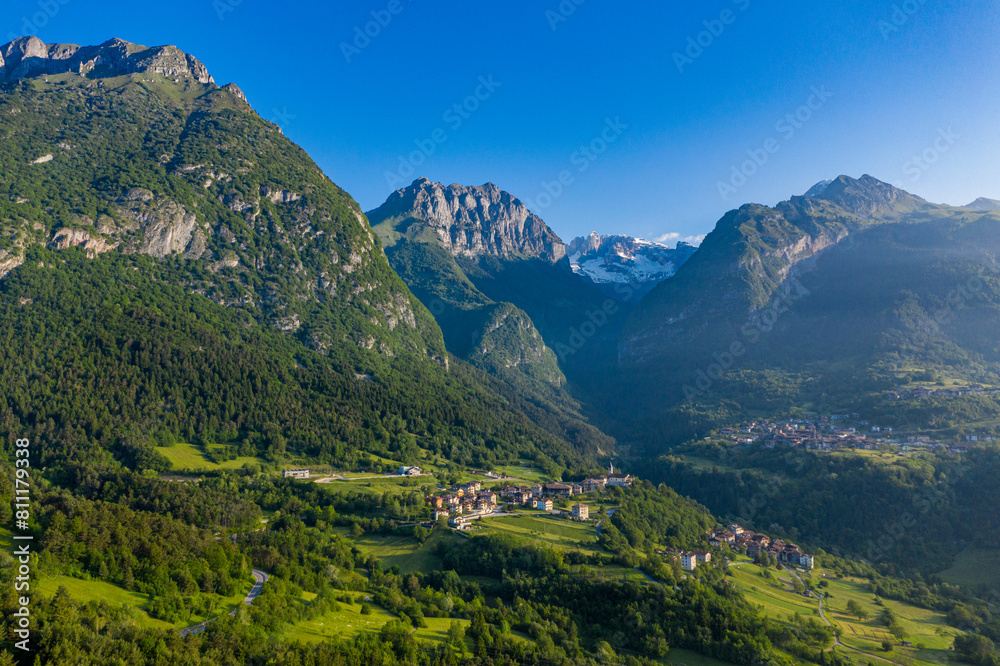 Aerial View of Stenico in Trento, Italy, Lush Alpine Village Landscape in Trentino-Alto Adige