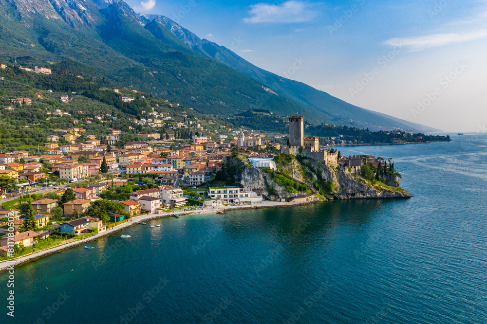 Aerial View of Scaliger Castle in Malcesine on Lake Garda, Historic Architecture Against Vibrant Town and Blue Waters