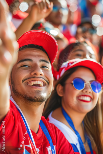 Panamanian football soccer fans in a stadium supporting the national team, La Marea Roja 