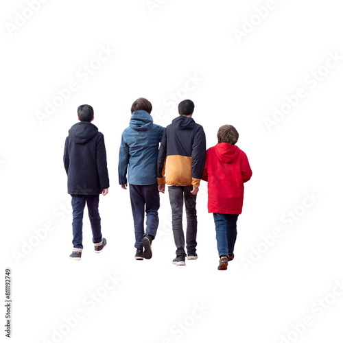 Une bande quatre  de copains vus de dos qui se promènent, ils ont entre 13 et 15 ans, ils sont chaudement habillés, ils marchent très proches les uns des autres photo